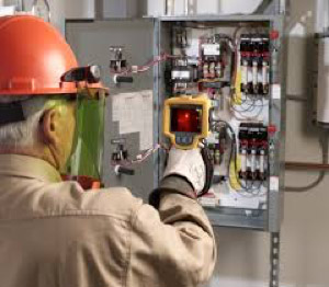 building operator using tool to test equipment